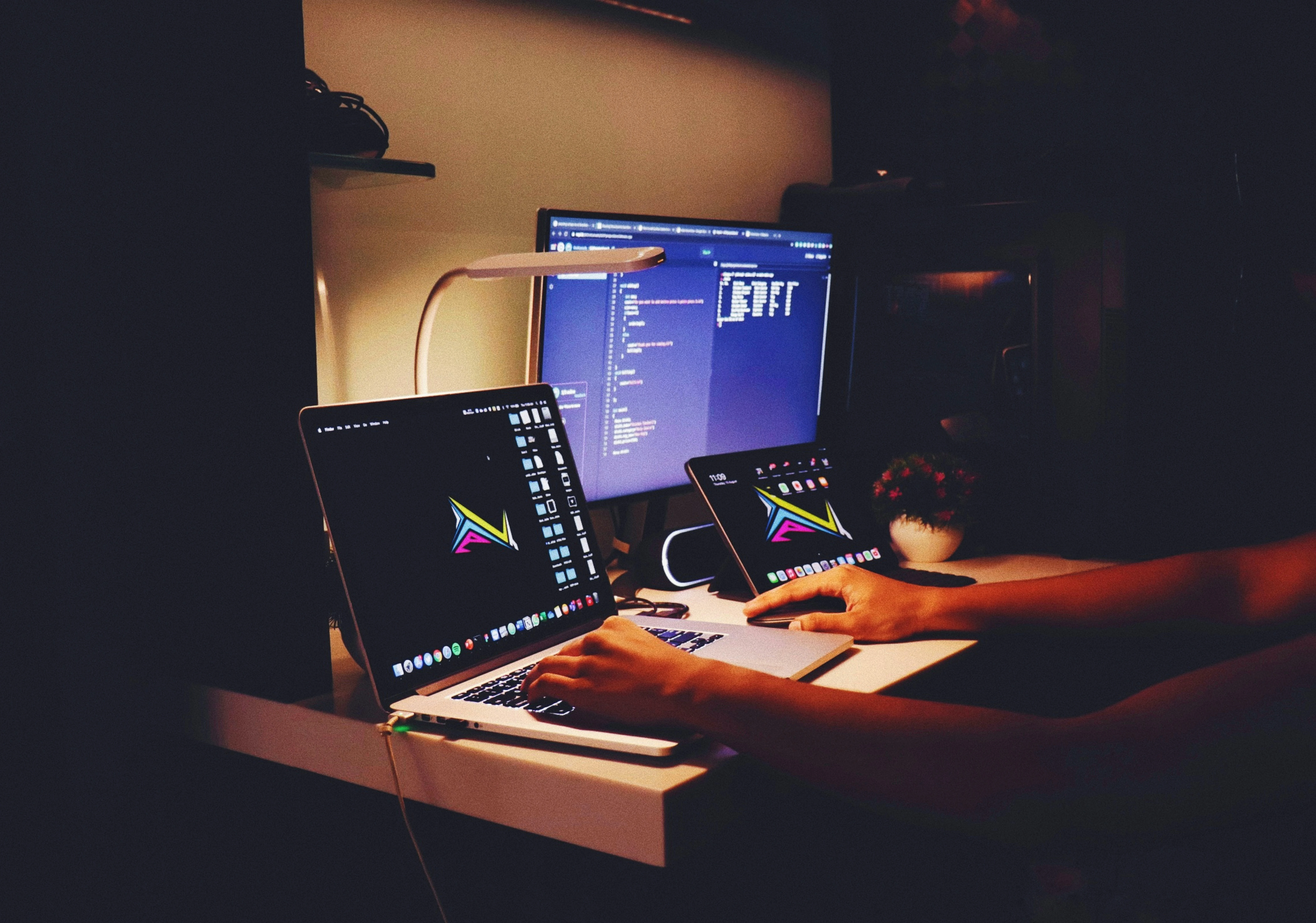 Developer working late at night debugging server configurations and AWS setup issues